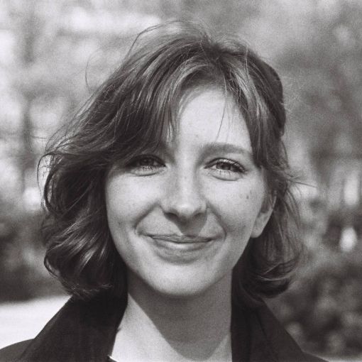 Black and white photograph of artist Sienna Curby.