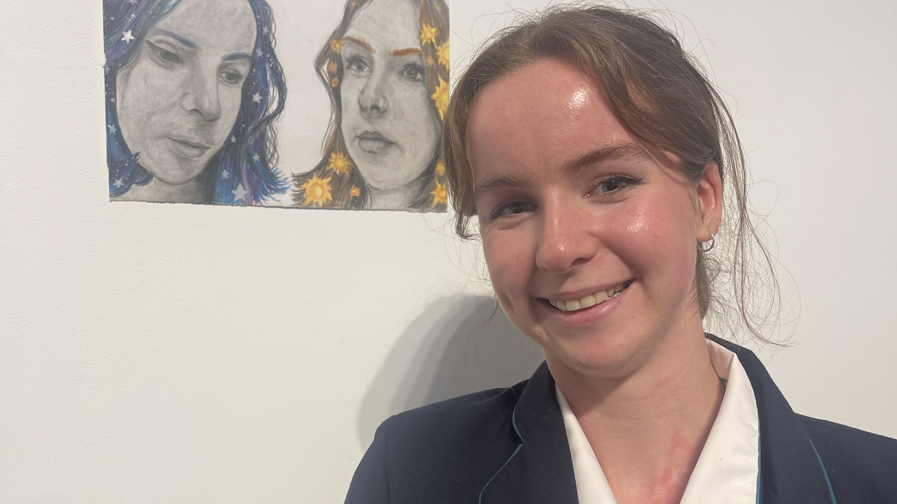Image 2022 scholarship winner Raphaella Herford with artwork titled Highs Lows and Inside Out.