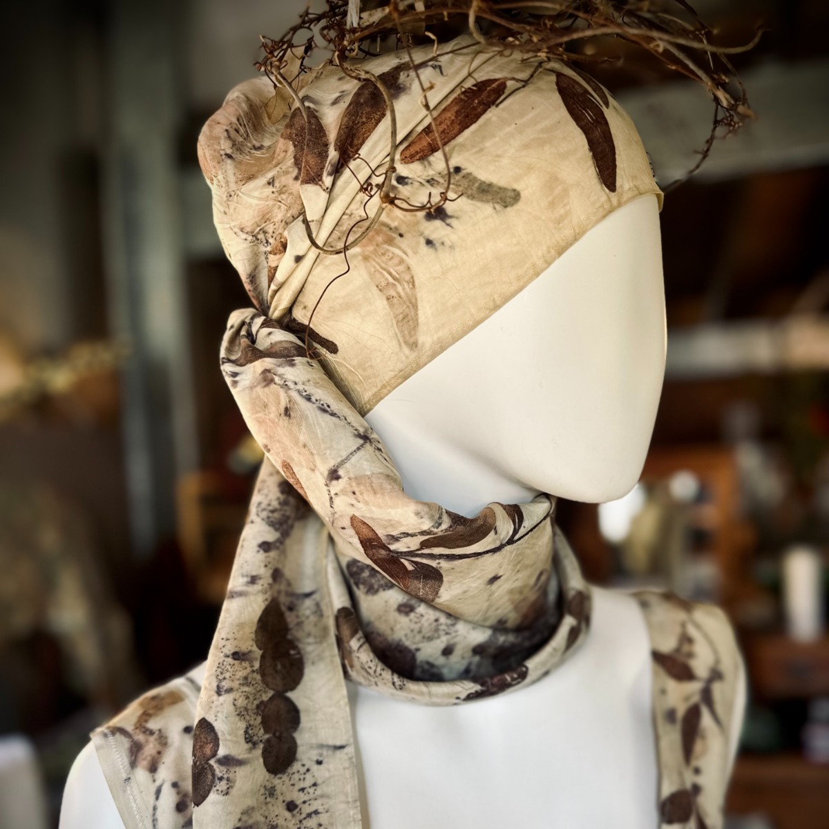 Image Botanical printed head and neck scarf on mannequin.