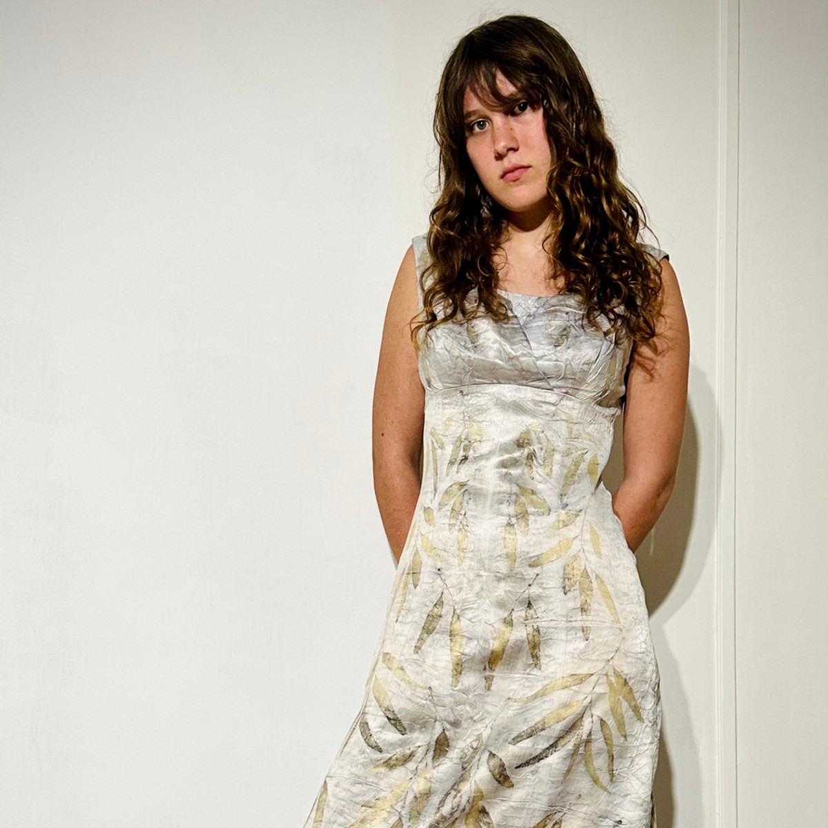 Image Image of model wearing botanical print dress.