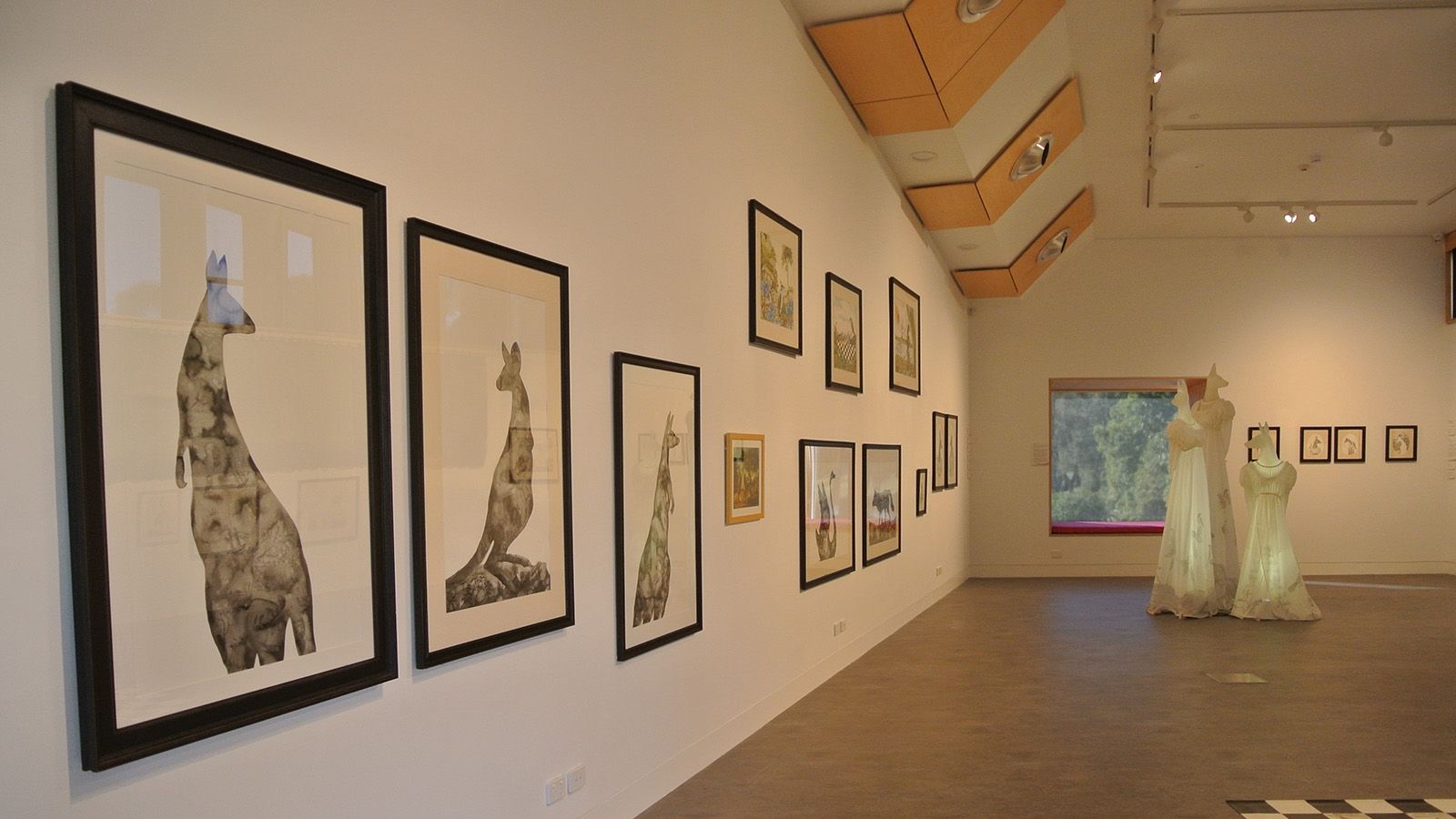 Artworks hung on the gallery wall at the Basil Sellers Exhibition centre banner image