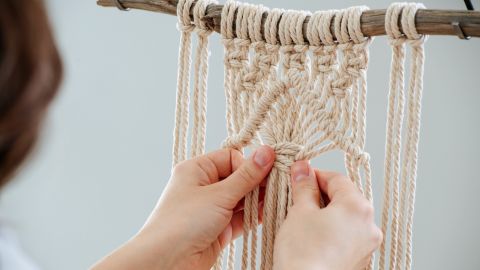 Photo of person making macrame